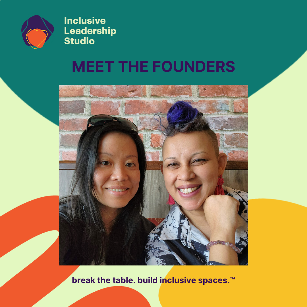 Two smiling women sitting in front of a brick wall. The woman on the left has long, straight hair and is wearing sunglasses on her head. The woman on the right has short, curly hair with a purple streak and is wearing large, red earrings. The top of the image has the text 'Inclusive Leadership Studio' with the logo, and 'MEET THE FOUNDERS'. At the bottom, there is text that reads 'break the table. build inclusive spaces.™ 